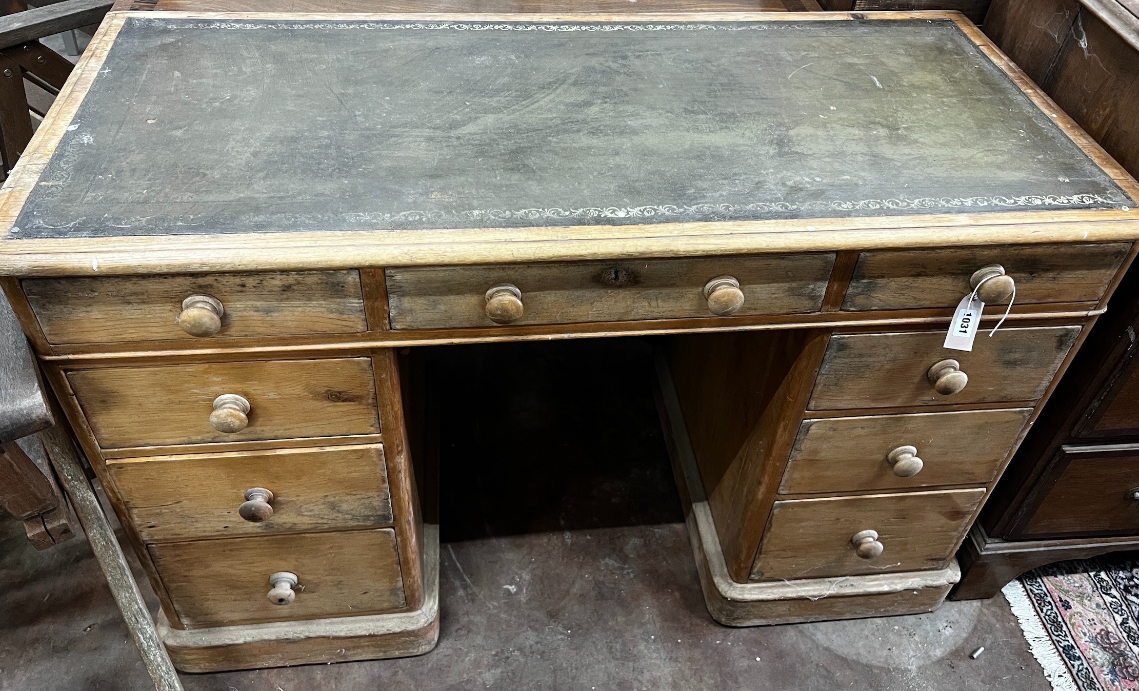 A Victorian pine kneehole desk, width 120cm depth 55cm height 77cm